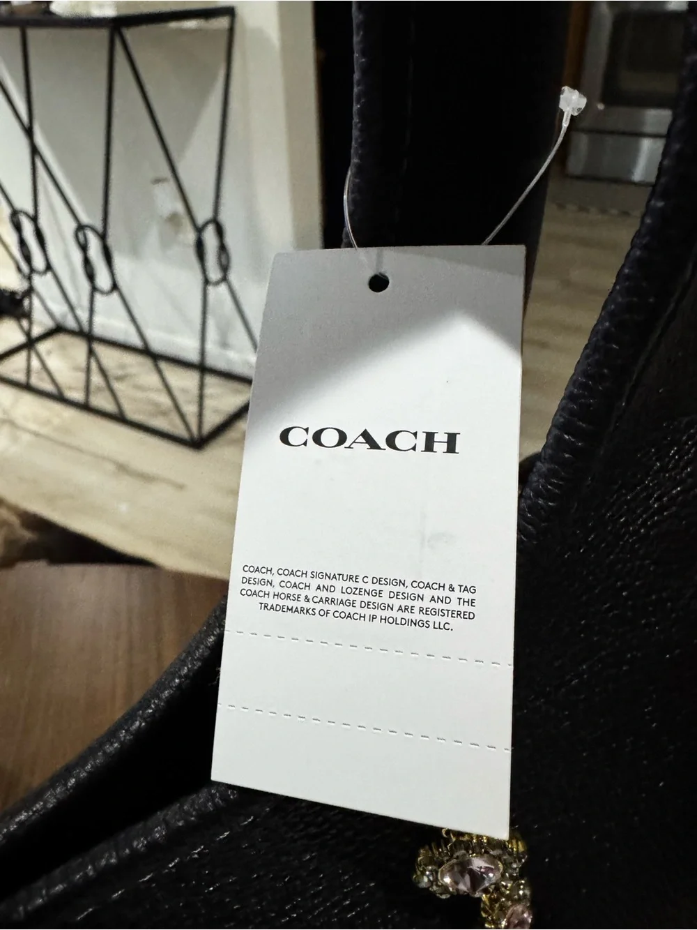 Coach Black Pebbled Leather Hobo with Gold Floral Chain Accent